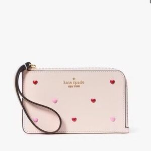 Kate Spade Cream Wristlet with Heart Accents